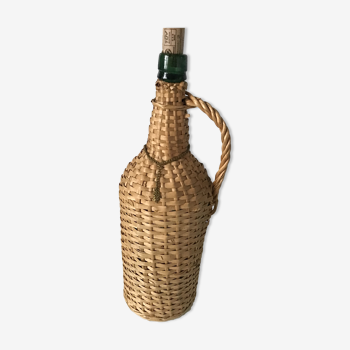 Set of 2glass bottles covered with wicker or rattan