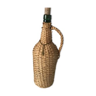 Set of 2glass bottles covered with wicker or rattan