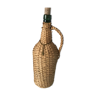 Set of 2glass bottles covered with wicker or rattan