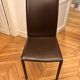 Many brown leather chairs "Roche Bobois"