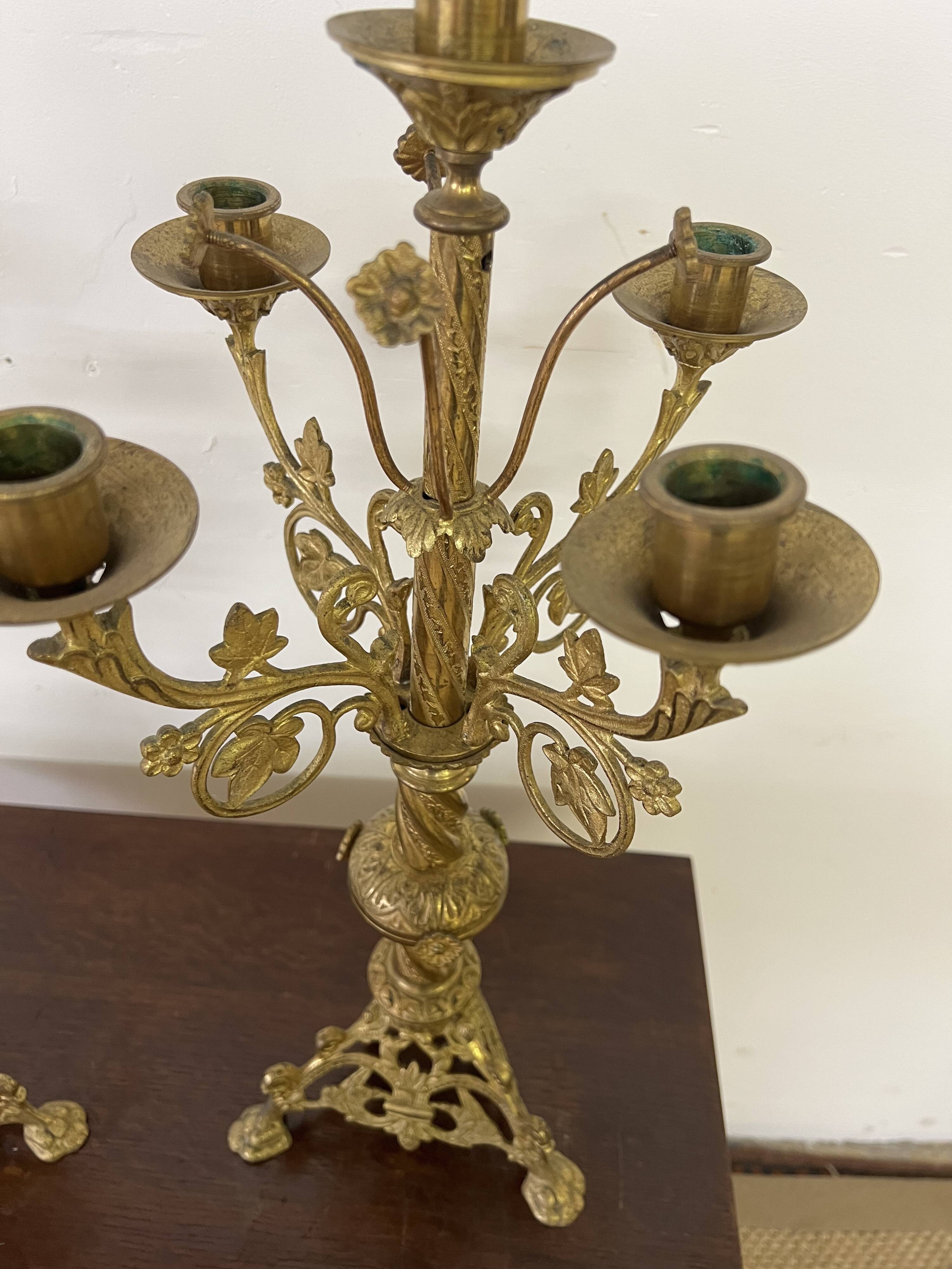 Pair of old altar candelabras in gilded brass from the 19th century