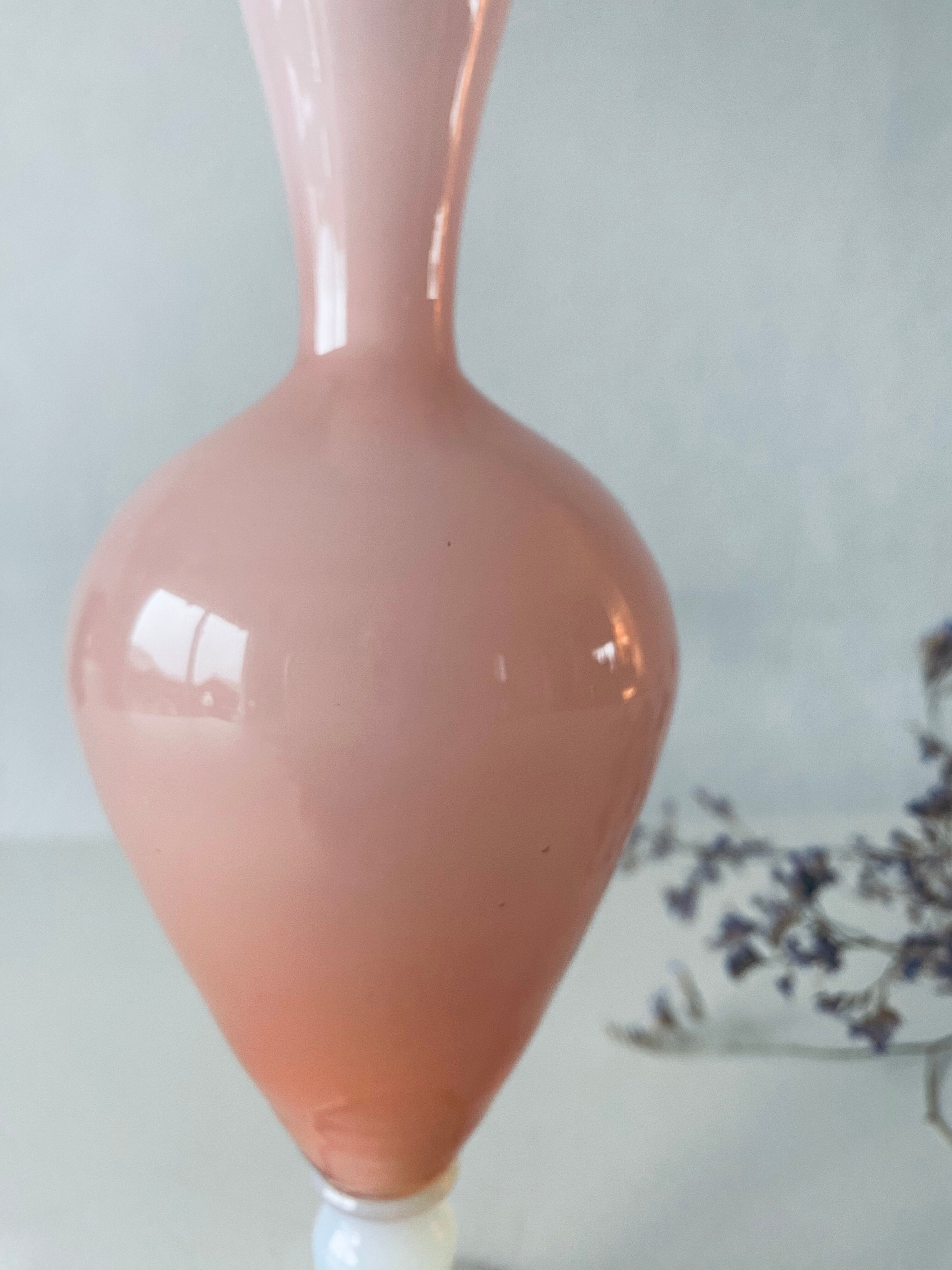 Old vase in pink opaline