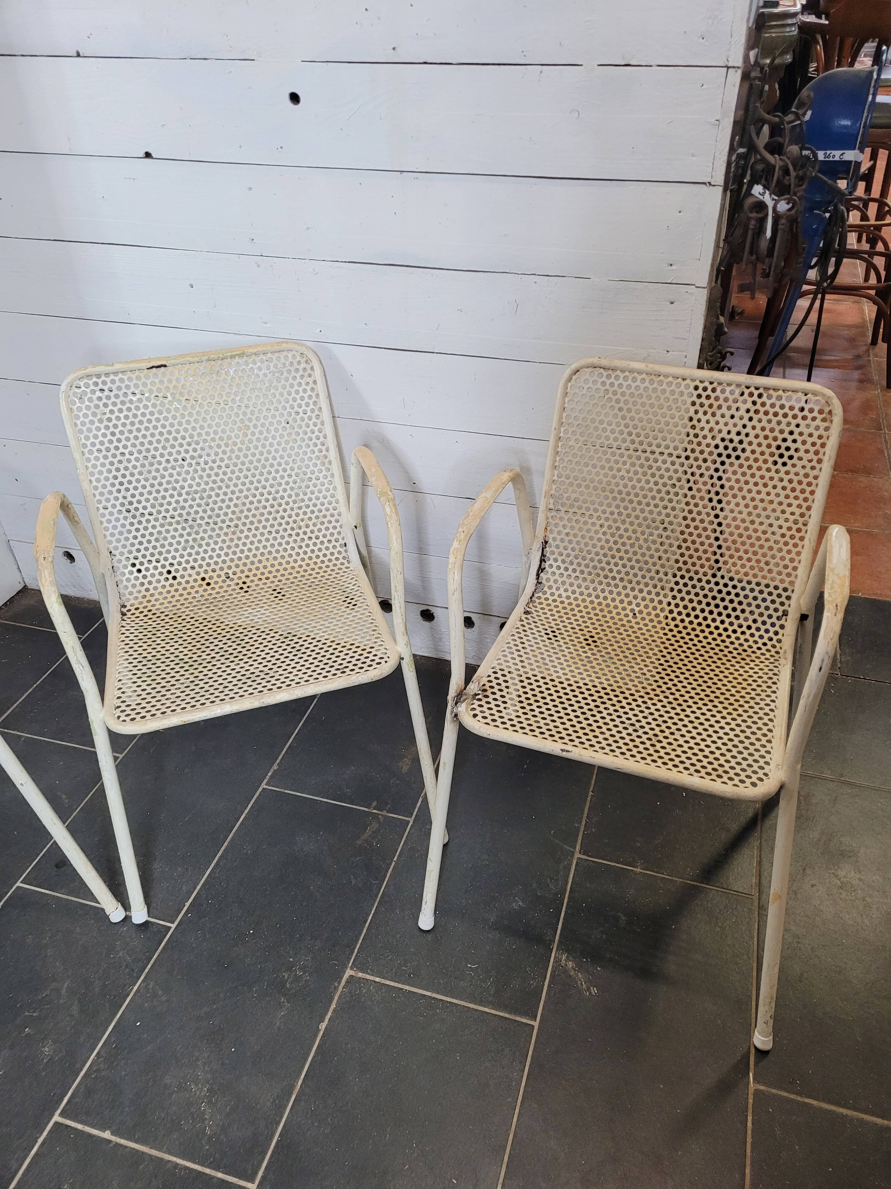 4 perforated metal garden armchairs