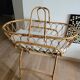 Rattan bassinet with support