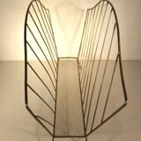 Golden metal magazine rack from the 60s