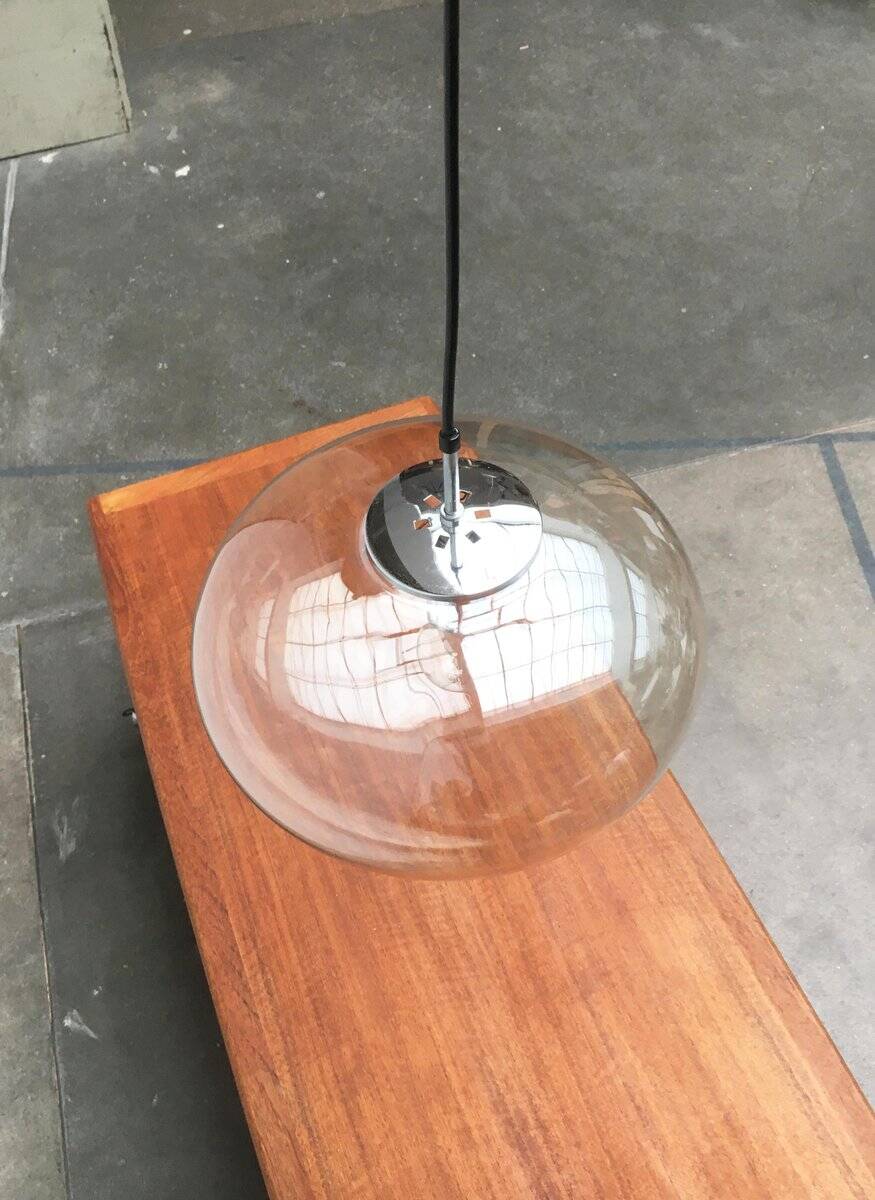 Suspended UFO-shaped glass luminaires in mid-century German Space Age style, set of 3.