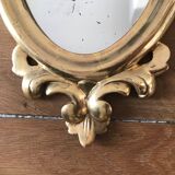 Pair of gilded rococo mirrors in carved wood