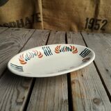 Dish out of ceramics decor orange and green