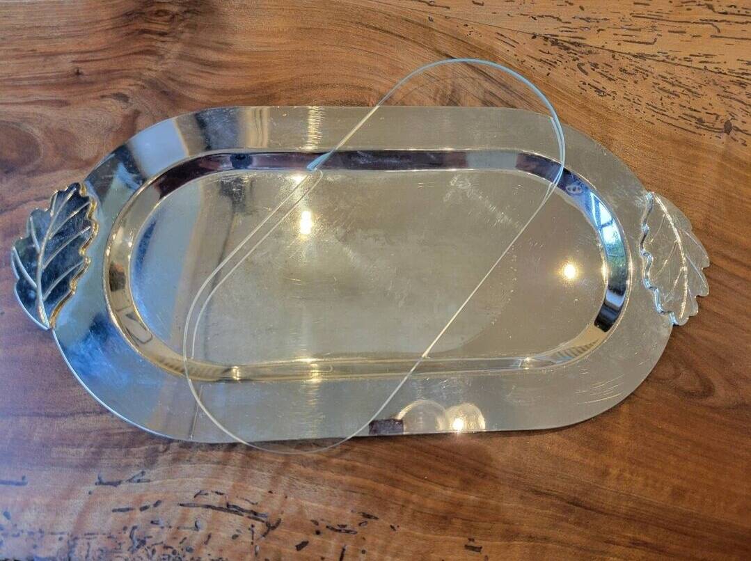 Silver foie gras dish with glass window