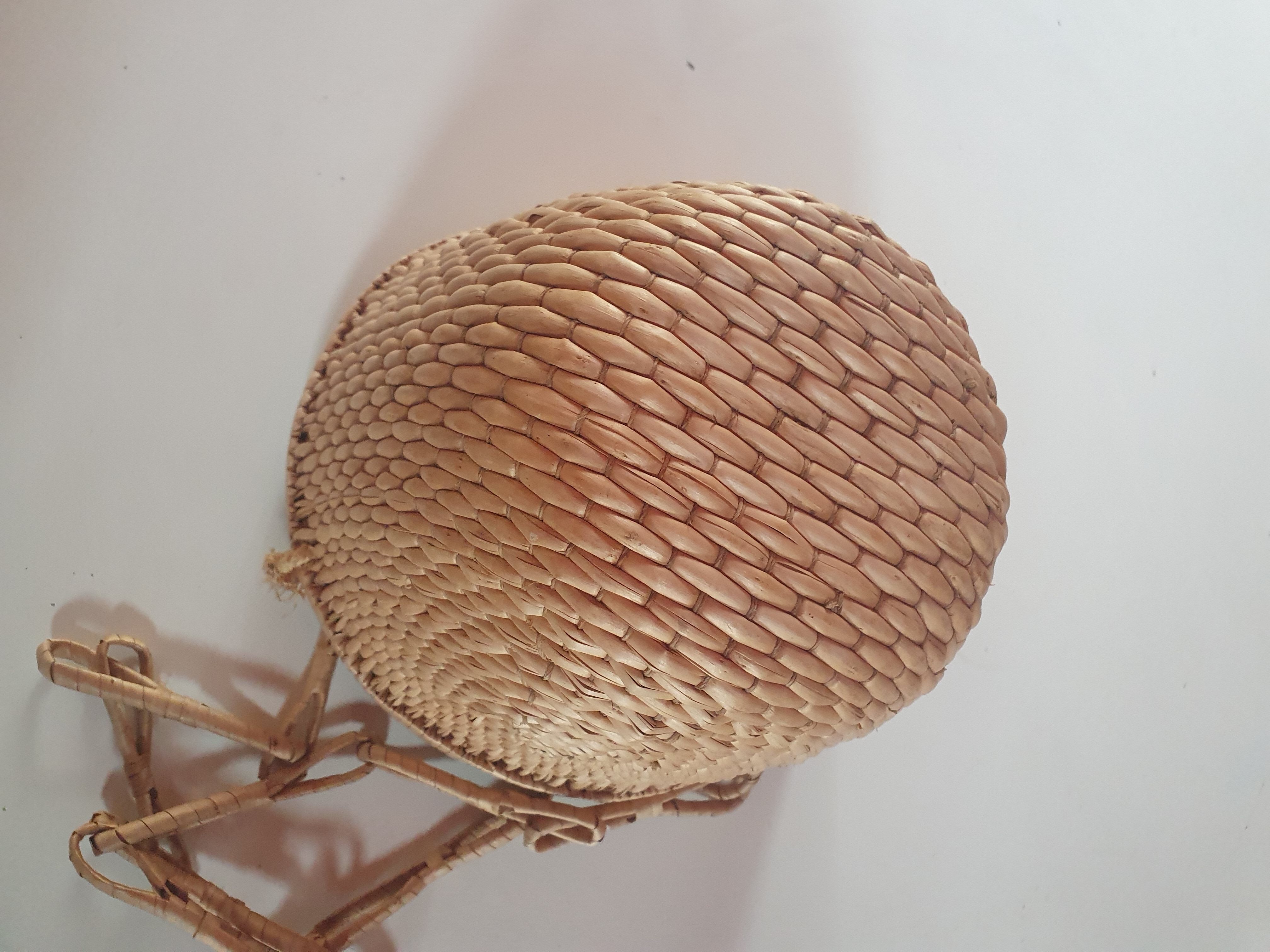 Rattan basket to hang vintage plant door