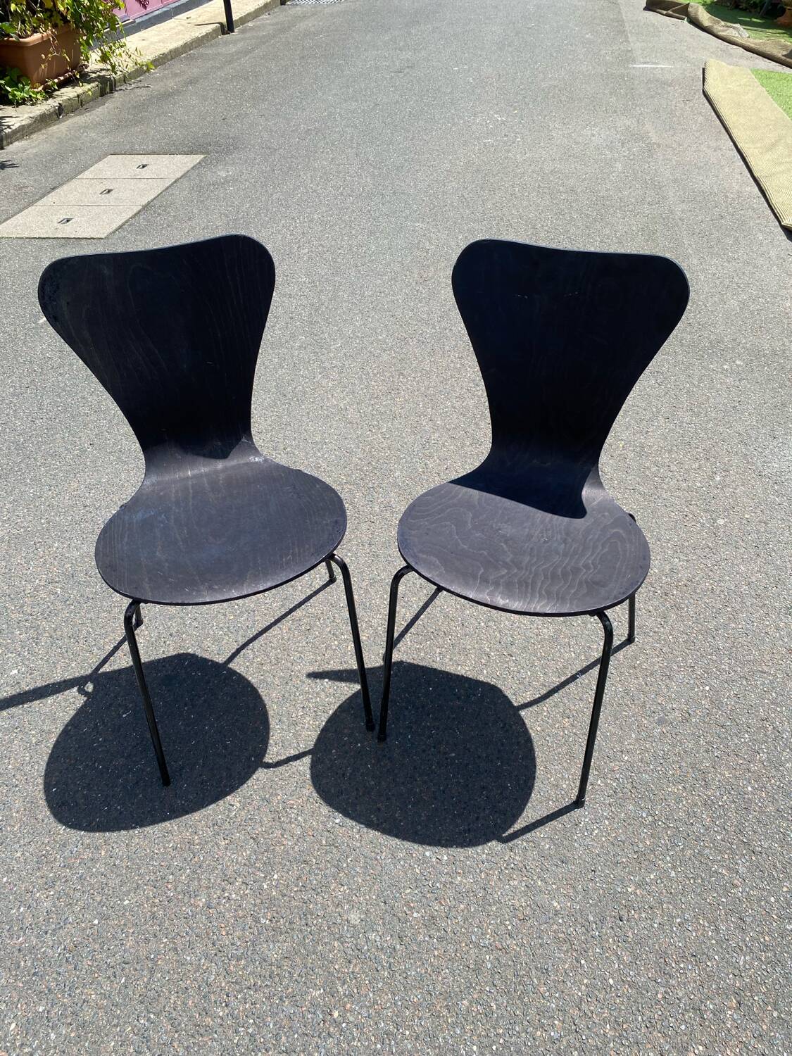 Pairs of wooden chairs