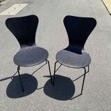 Pairs of wooden chairs