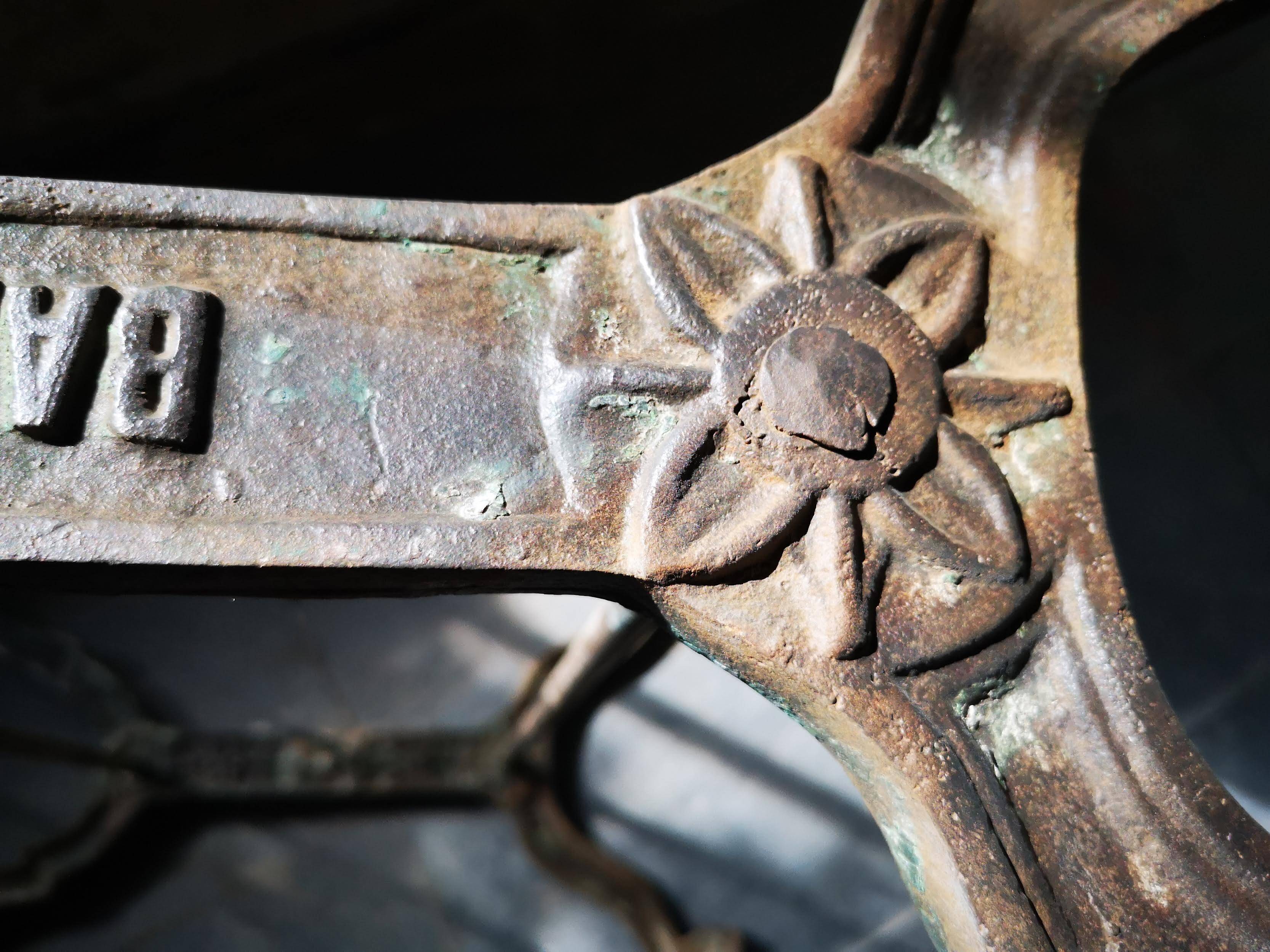 Old bistro table – cast iron legs and natural slate top