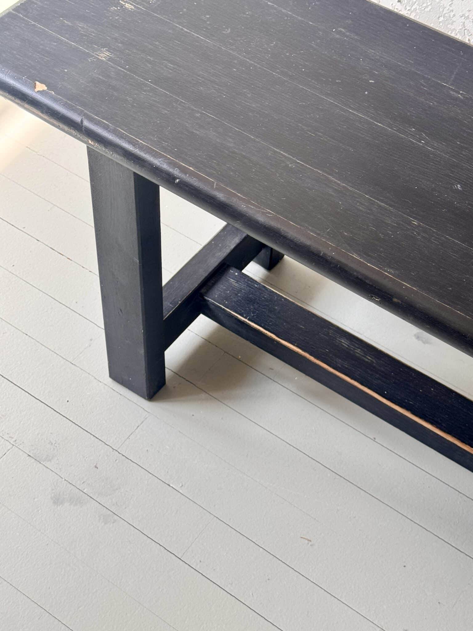 Antique black patinated wooden bench