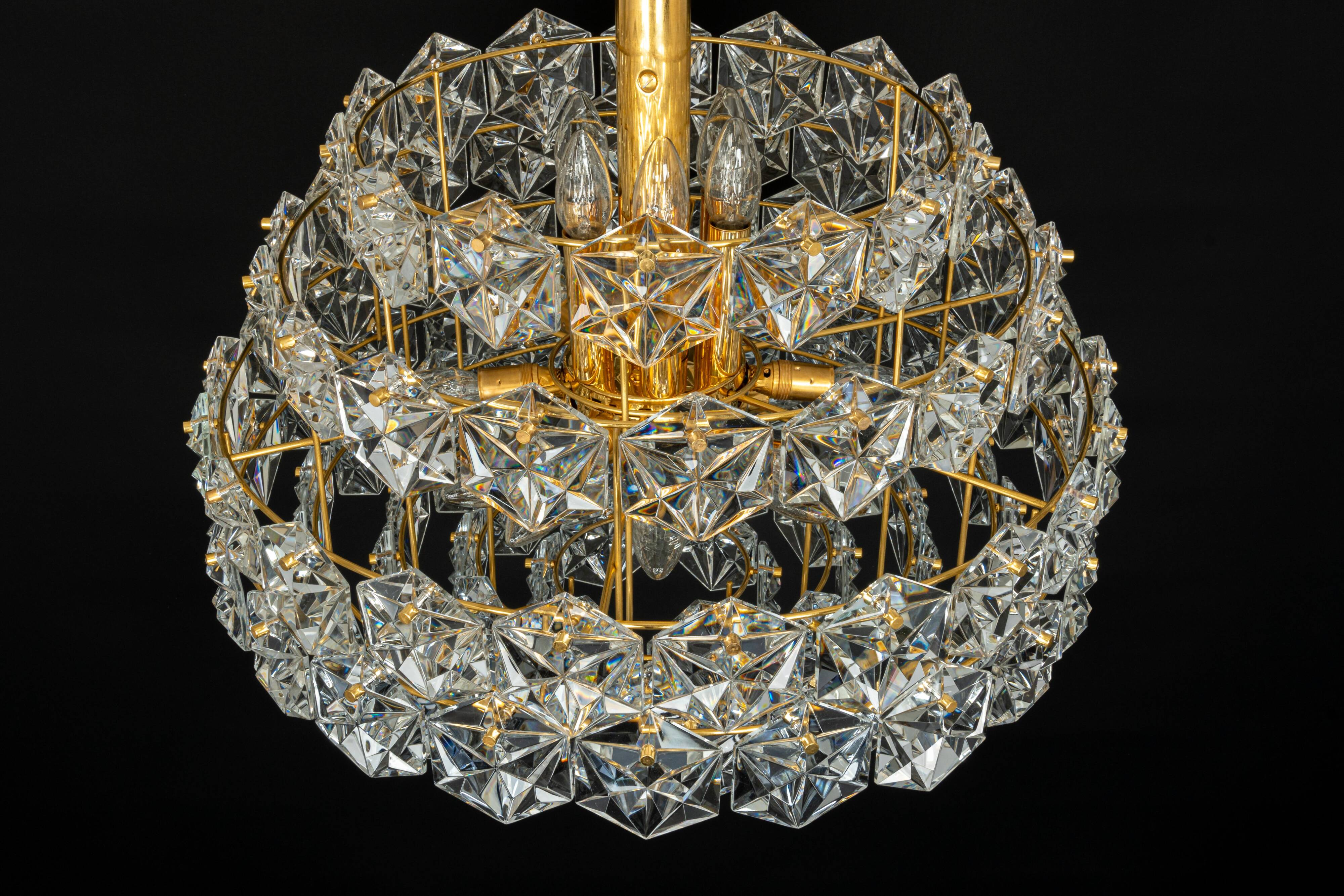 Chandelier, brass and crystal glass by Kinkeldey, Germany, 1970s.
