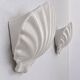 Vintage pair of white porcelain wall lights, France 1970.