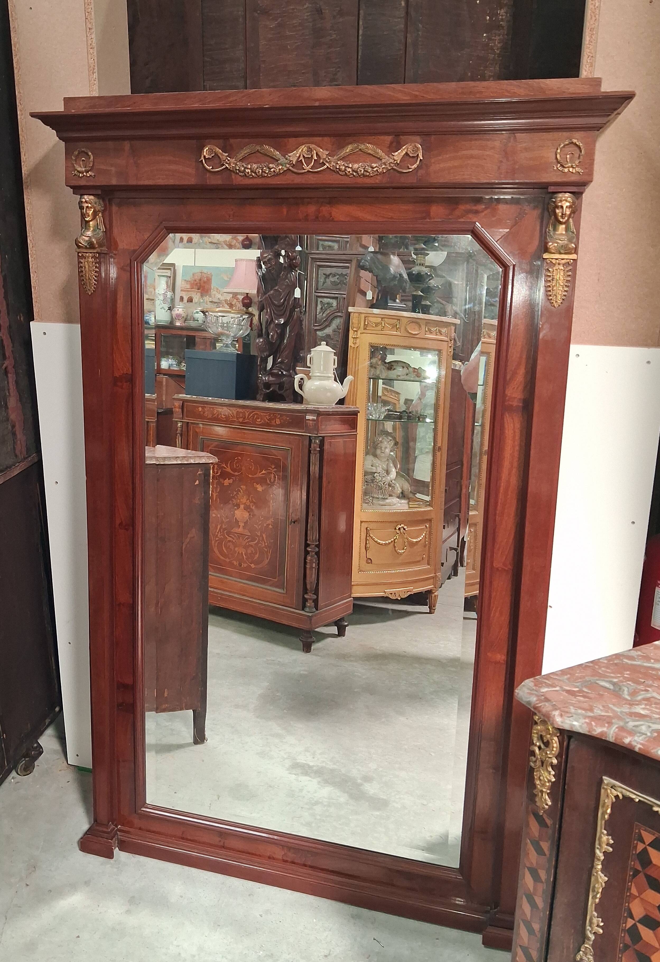 Large Empire-style mahogany mirror – Mercury-gilded bronzes –