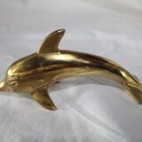 Family of dolphins in vintage brass