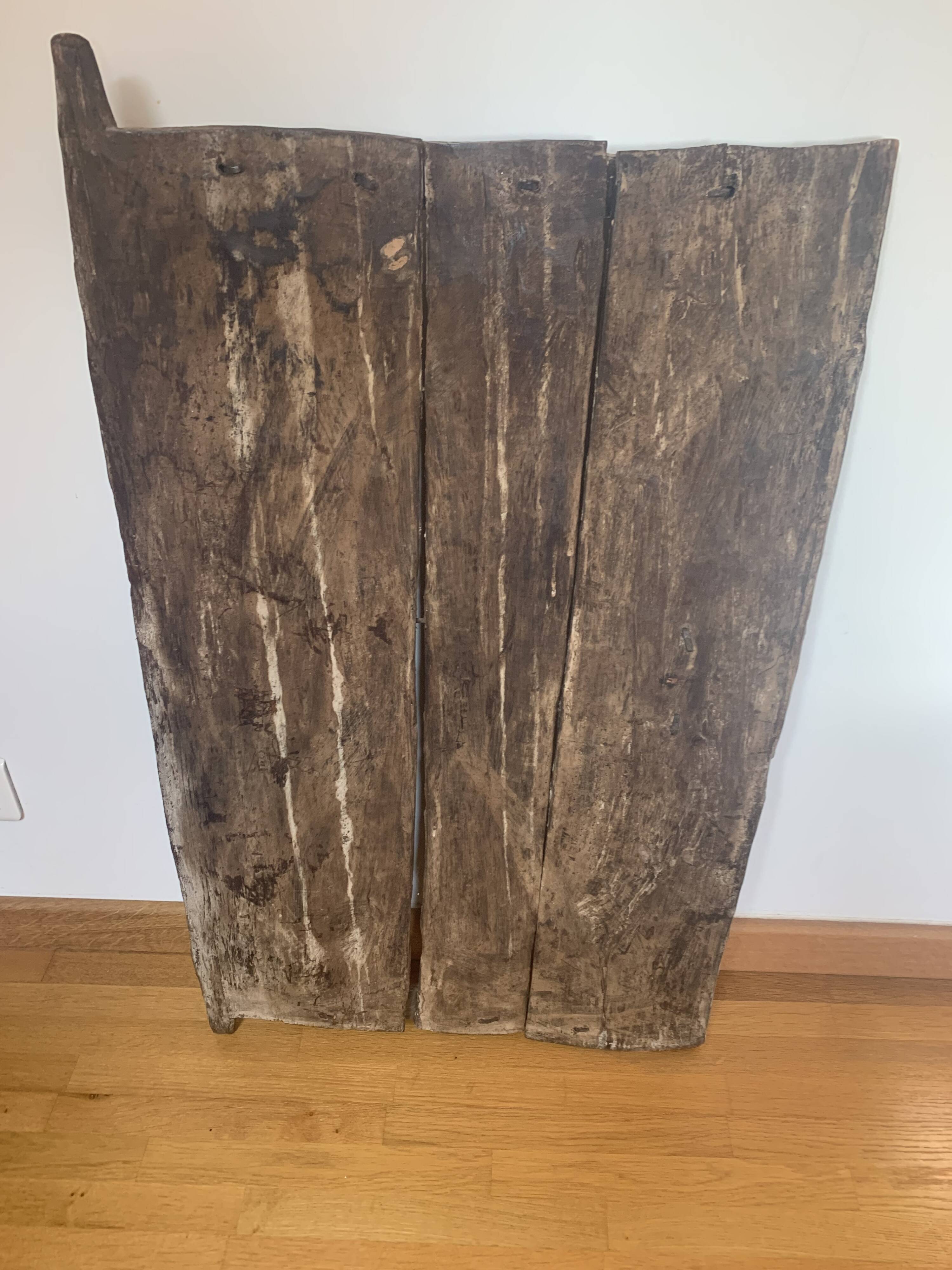 Old carved African door in solid wood – ethnic decoration – pi