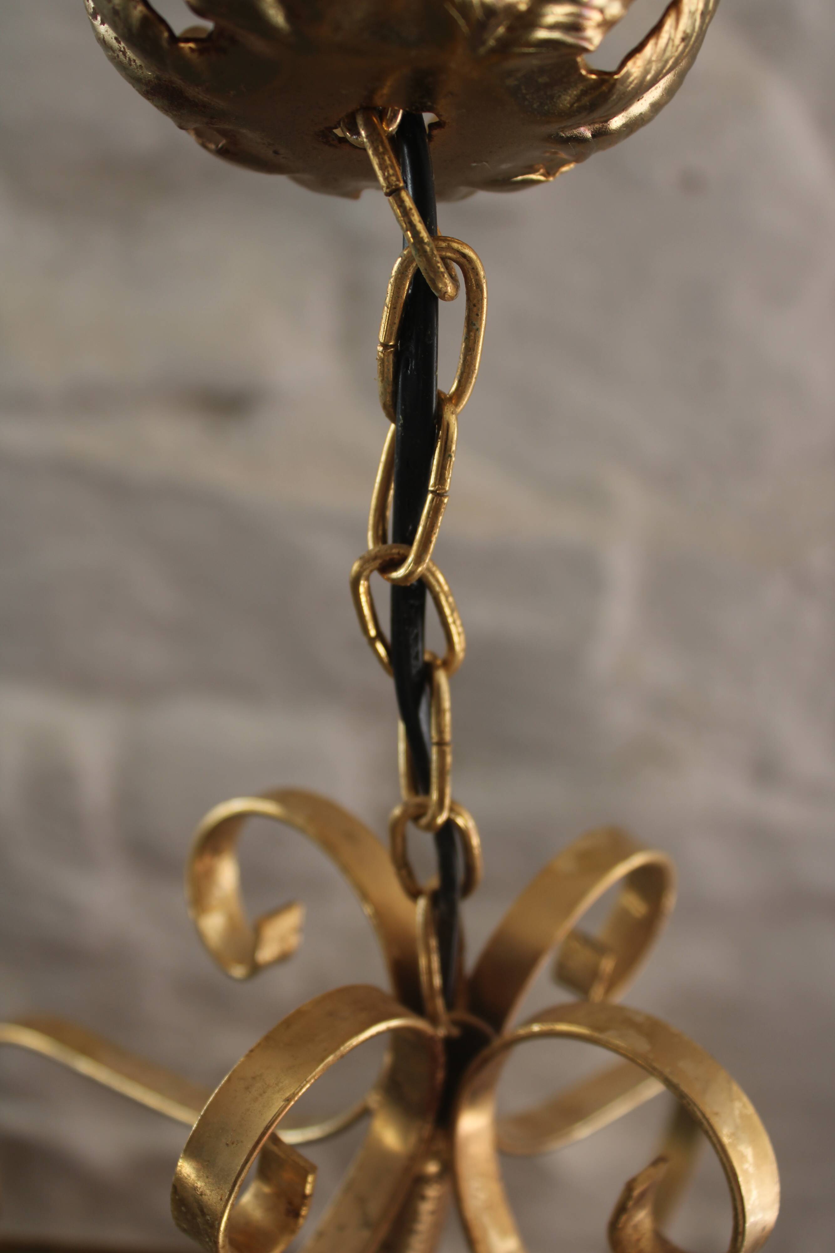 Glass and brass suspension