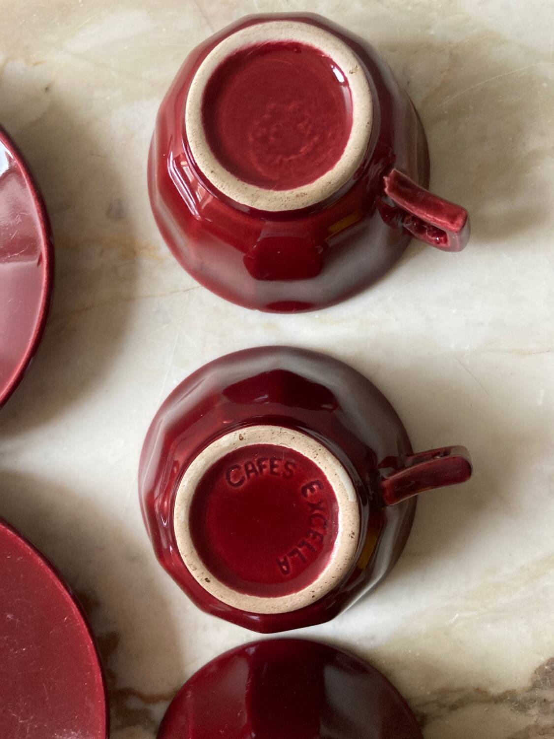 Burgundy cup and saucer
