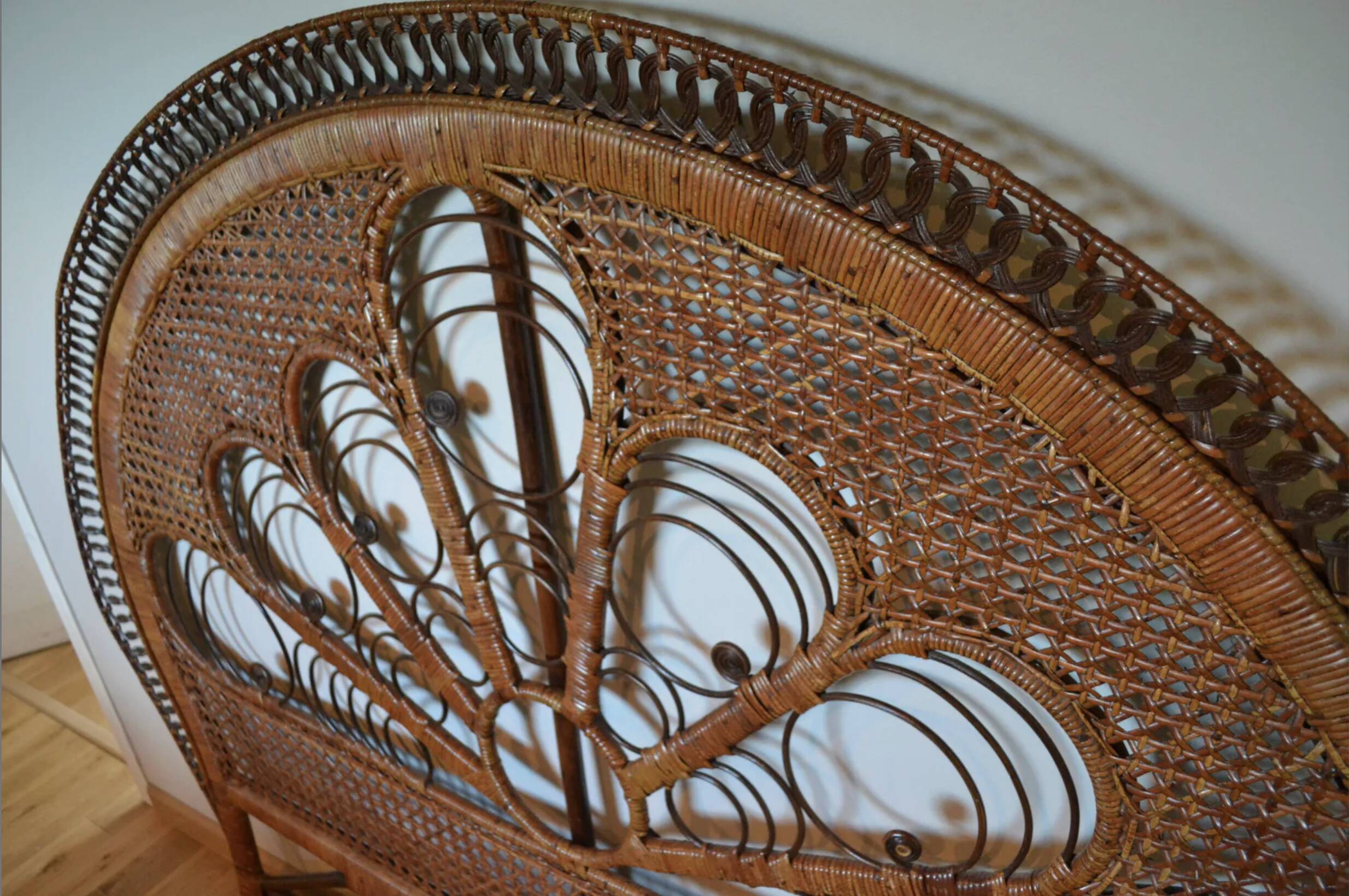 Brown peacock headboard for a 140cm bed.
