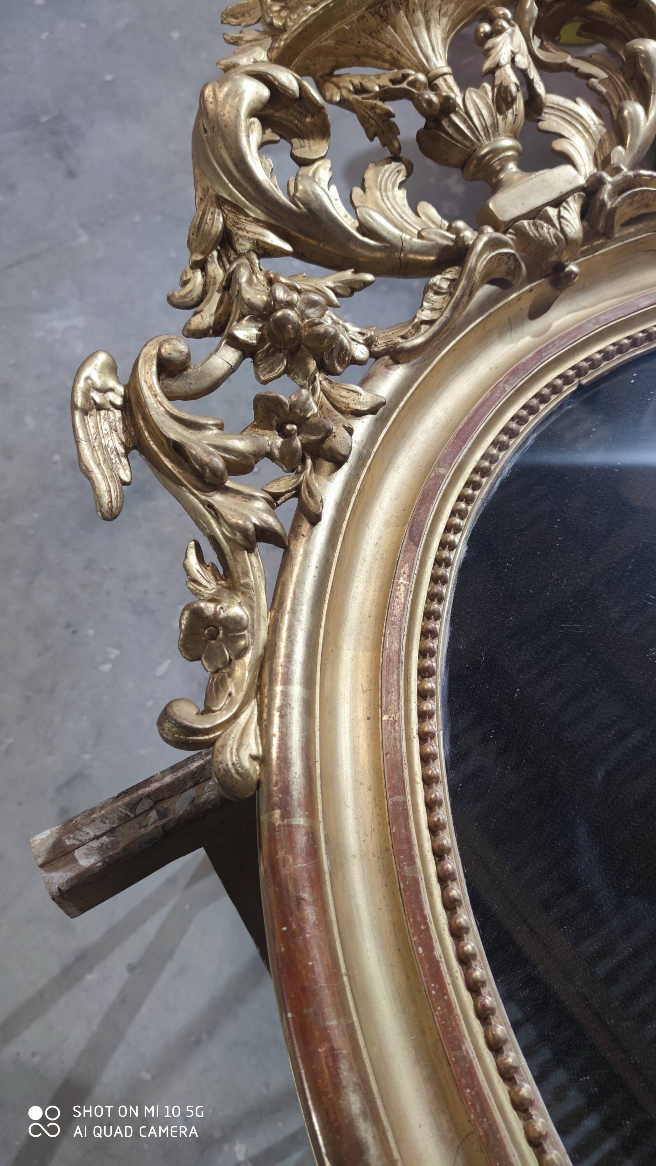 Mirror with a gilt medallion pediment, 1840