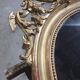 Mirror with a gilt medallion pediment, 1840