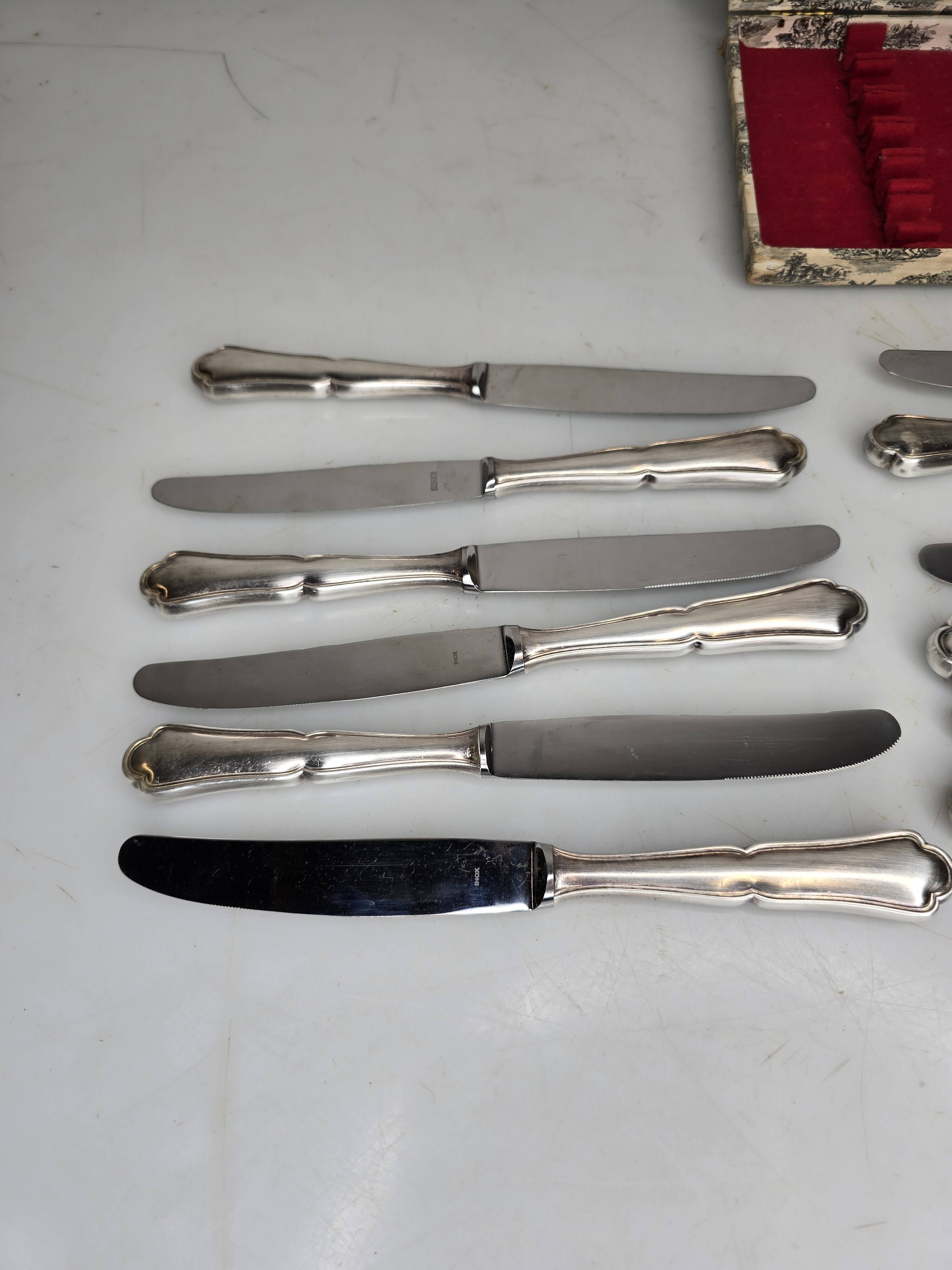 12 silver-plated knives mid-15th century