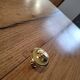 Polished brass furniture knobs