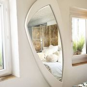 Dismantled Space Age XXL wall mirror in lacquered wood. France, 1970s.