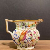 Old Paris porcelain milk jug with polychrome and gold bird floral decoration