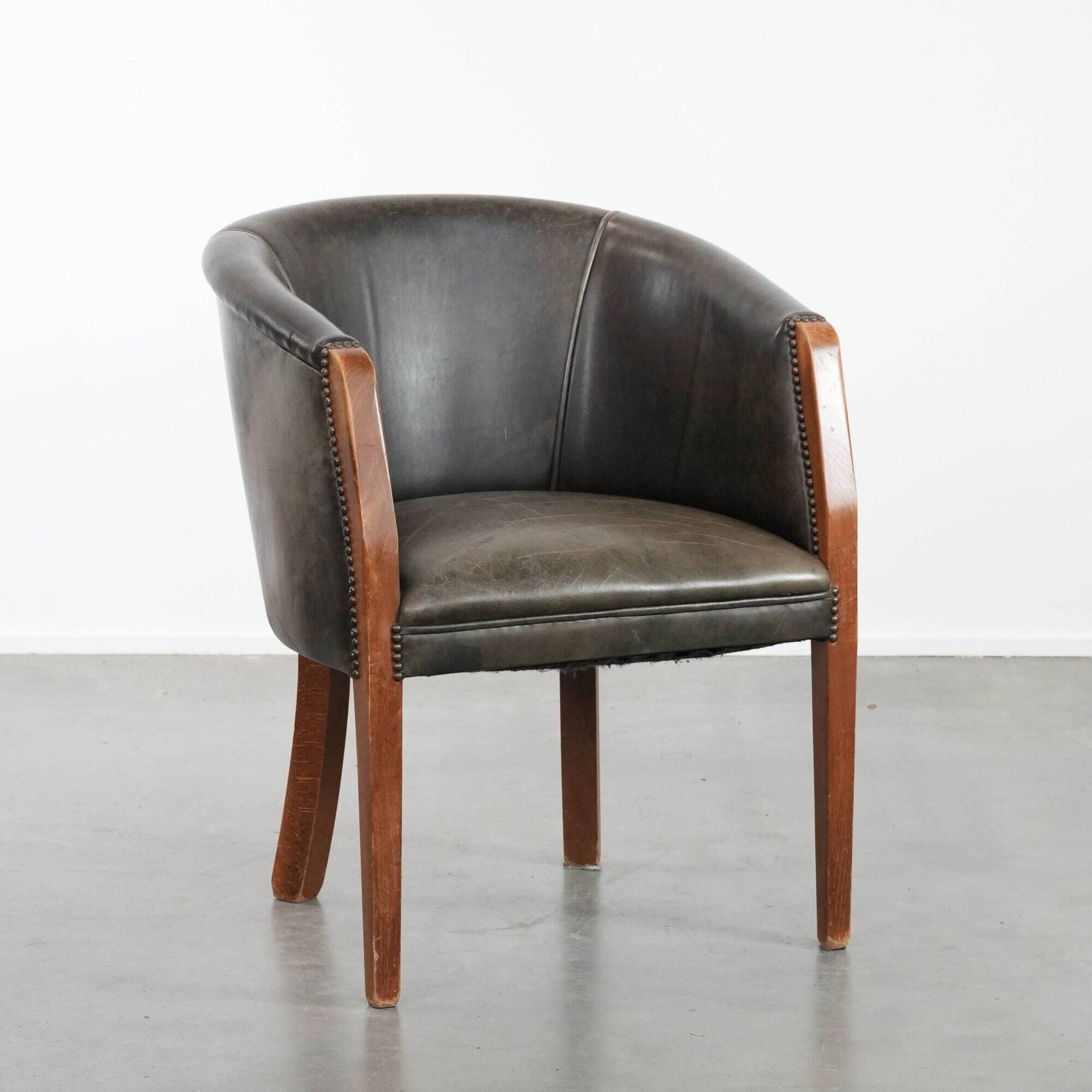 Amazing cow leather and wooden tub chair / side chair