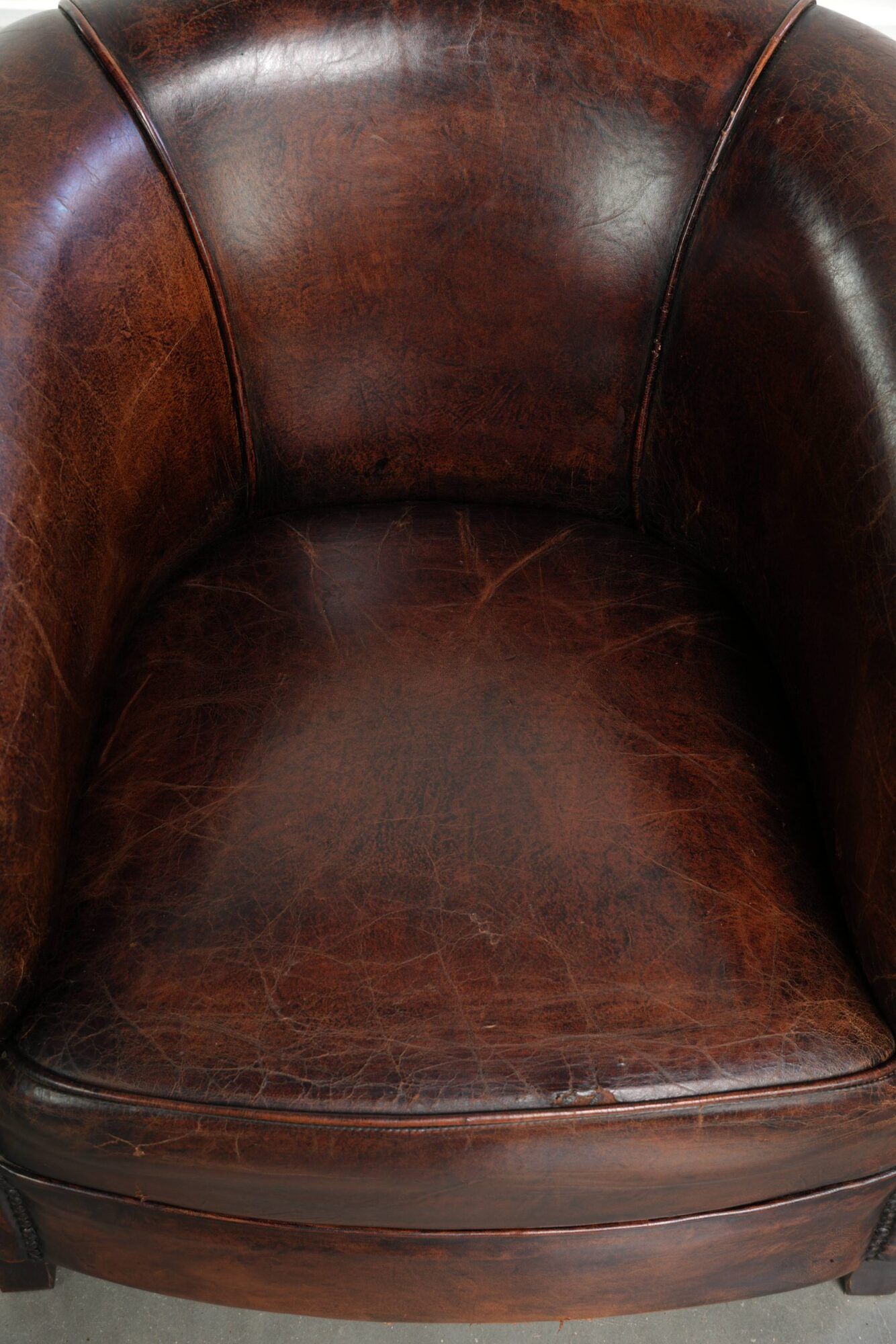 Vintage sheepskin club armchair with beautiful colours and a subtle size
