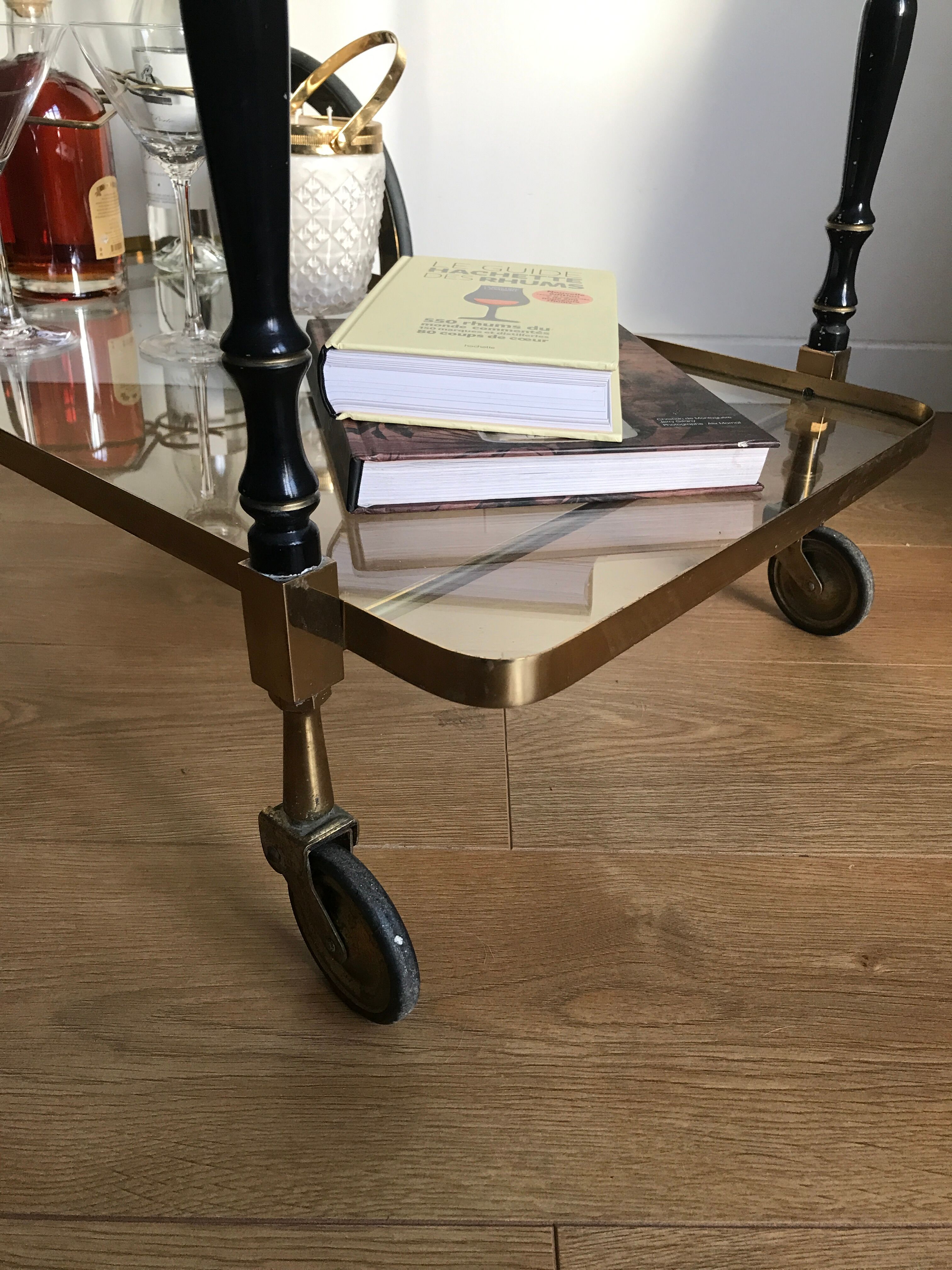 Vintage rolling golden and black dessert in brass and glass