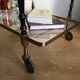 Vintage rolling golden and black dessert in brass and glass