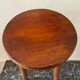 Tabouret en bois verni