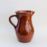 Vintage pitcher in glazed earth