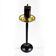 Vintage floor ashtray with a gold and black metal cigarette dispenser.