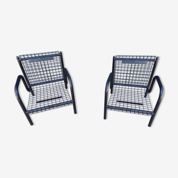Duo of black armchairs "grilling" metal