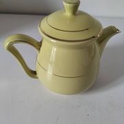 Vintage teapot in pastel yellow earthenware with gold trim