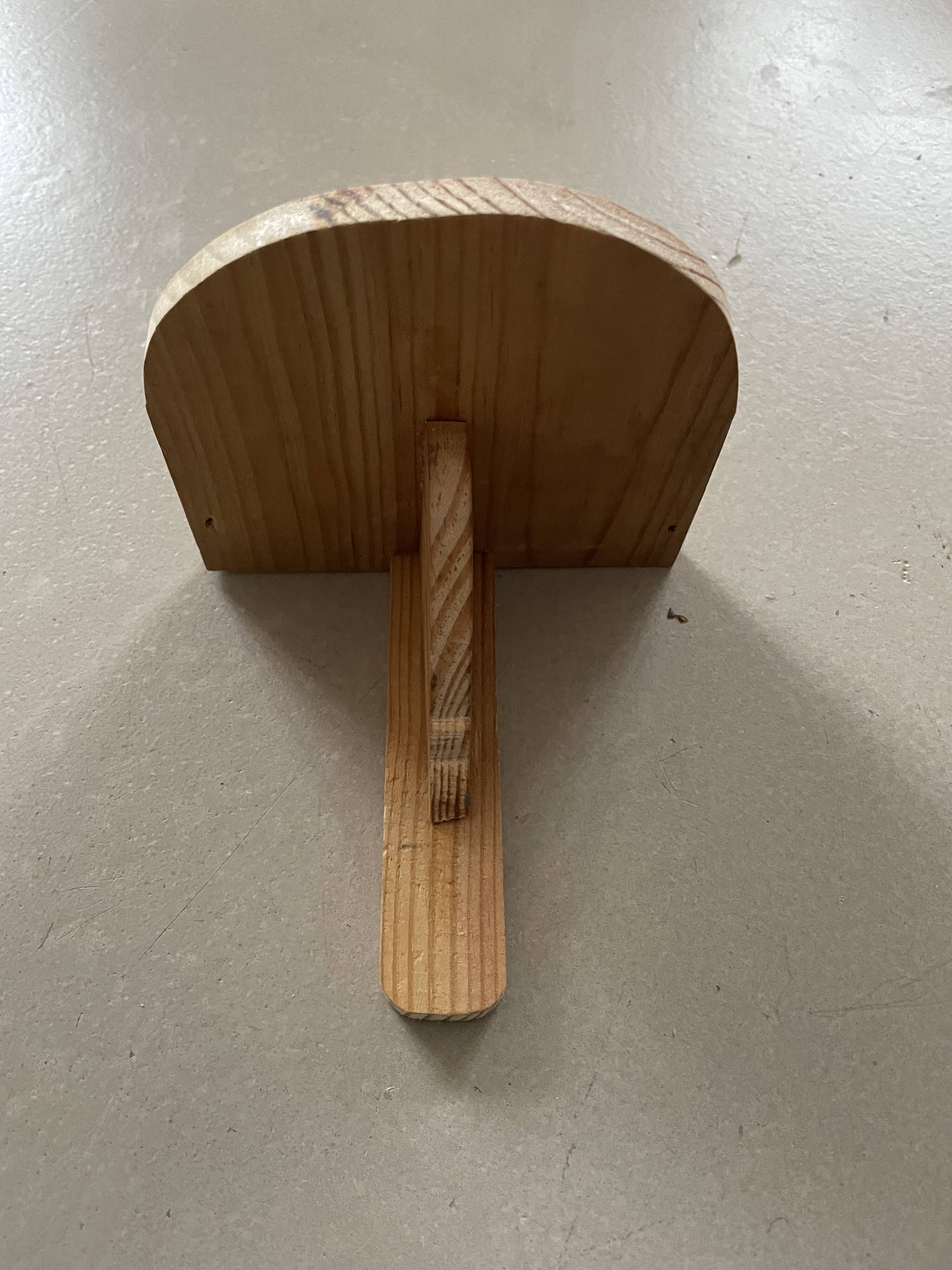 Small wall-mounted wooden shelf