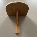 Small wall-mounted wooden shelf