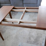 Table with two extensions and its 6 chairs scandinavian teak of the 1970s