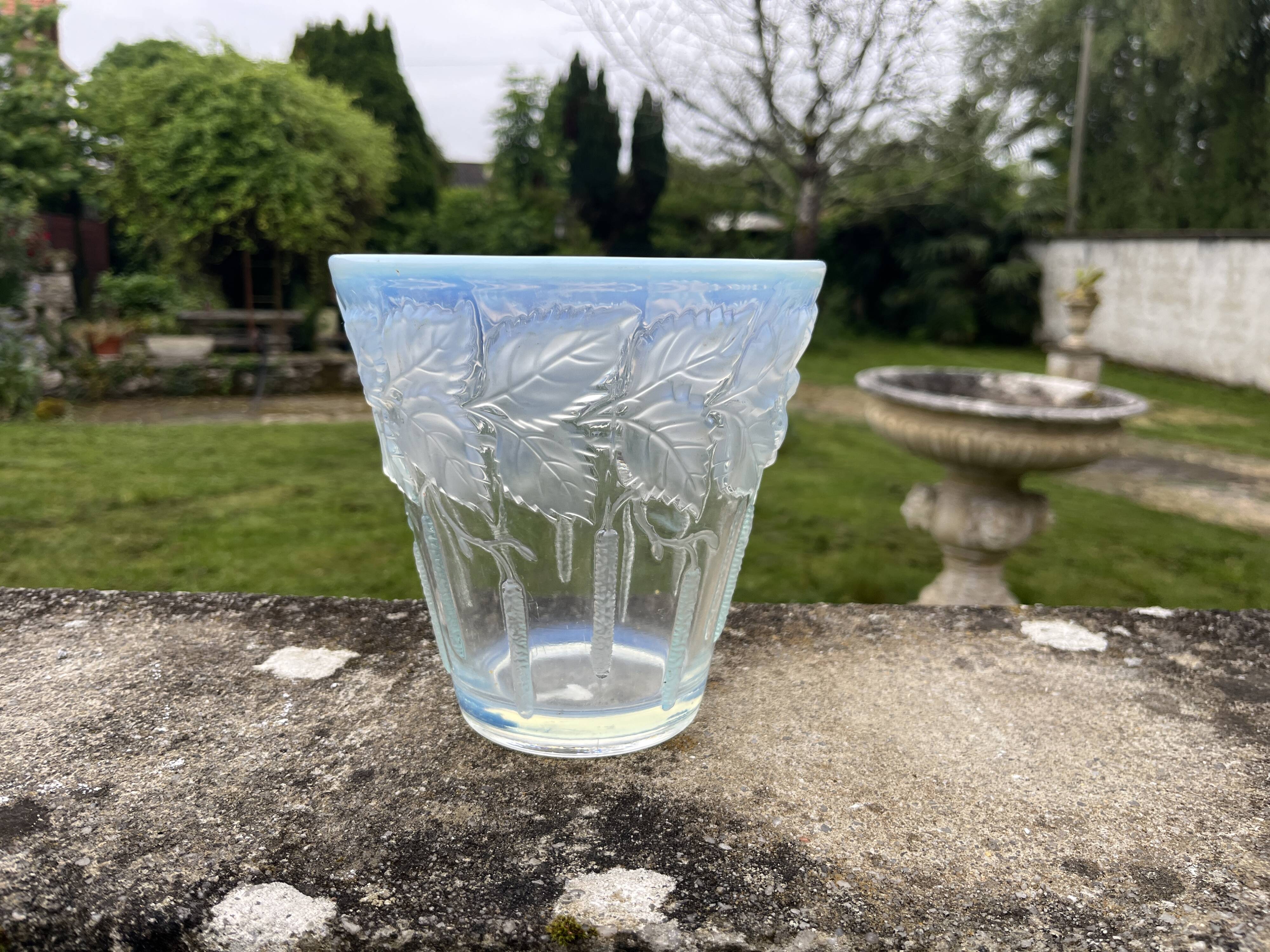 Opalescent glass vase moulded with leaf and catkin decoration – in the style of Lalique.