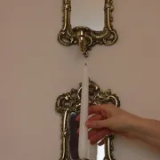 Pair of Mid-Century Swedish Brass Sconces with Mirror