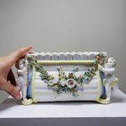 Small porcelain planter in antique German Putti style Meissen from the 19th century.