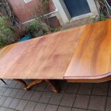 Napoleon III period walnut table from the late 19th century with extensions for 16 covers.