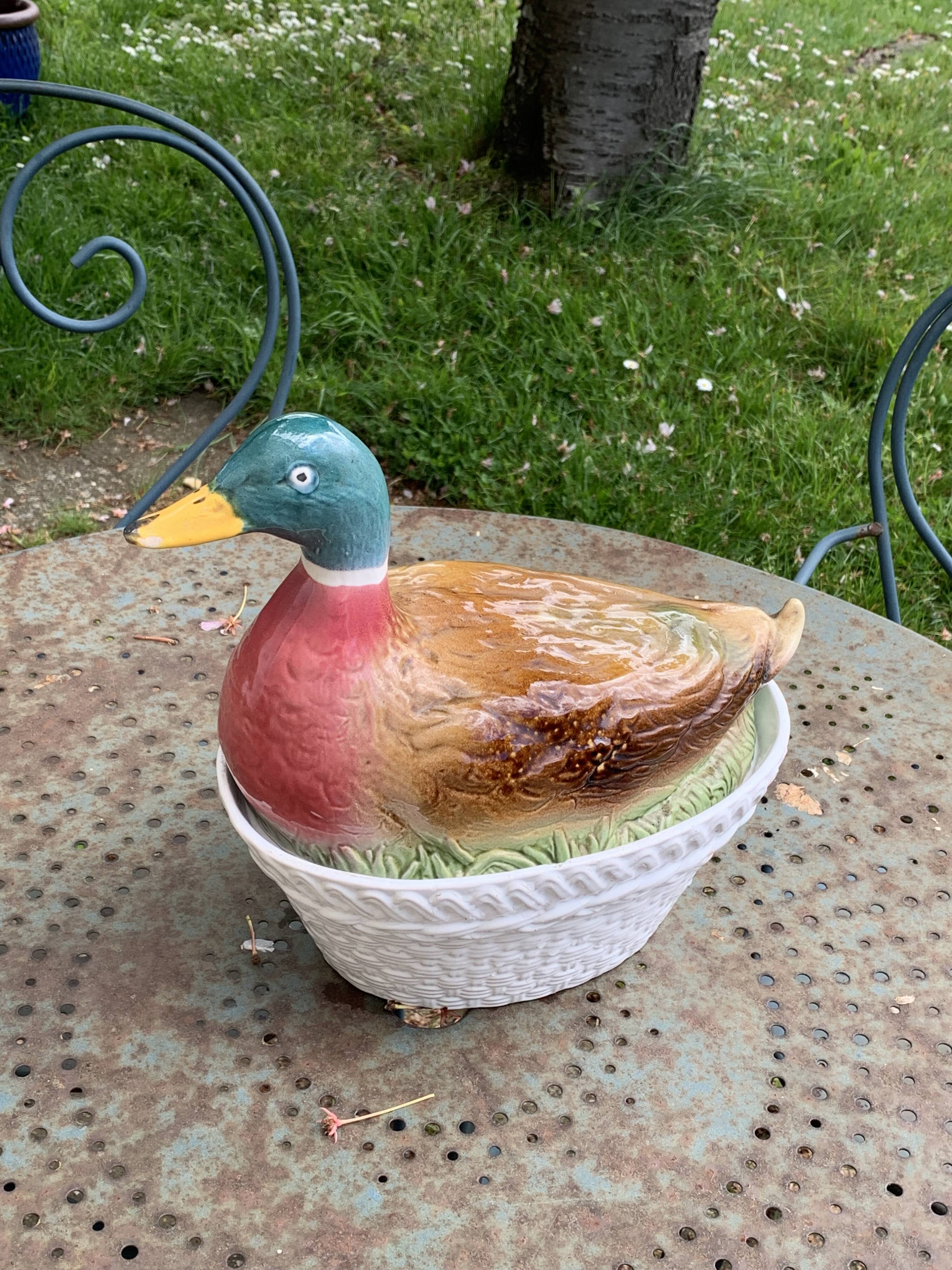 Charming Duck, slip, enameled ceramic terrine, white basket-shaped base and lid