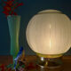 Lampe à poser globe vintage en verre granité vert et doré